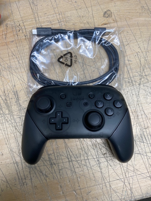 Photo 2 of Nintendo Switch Pro Controller
