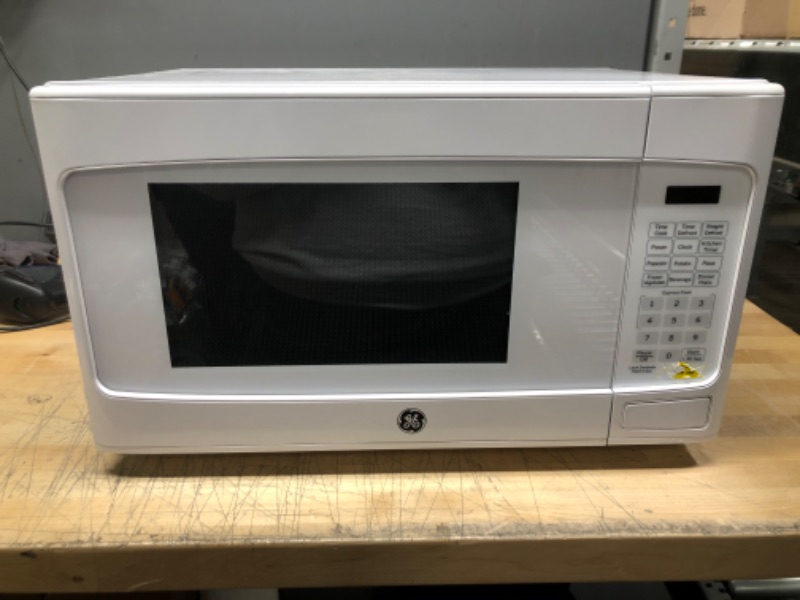 Photo 3 of  Capacity Countertop Microwave Oven with Weight and Time Defrost Convenience Cooking Controls Turntable and Instant on