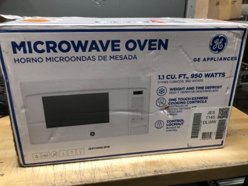 Photo 2 of  Capacity Countertop Microwave Oven with Weight and Time Defrost Convenience Cooking Controls Turntable and Instant on