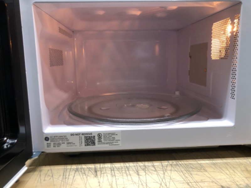 Photo 5 of  Capacity Countertop Microwave Oven with Weight and Time Defrost Convenience Cooking Controls Turntable and Instant on