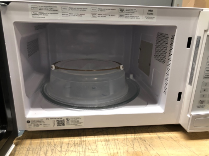 Photo 4 of  Capacity Countertop Microwave Oven with Weight and Time Defrost Convenience Cooking Controls Turntable and Instant on
