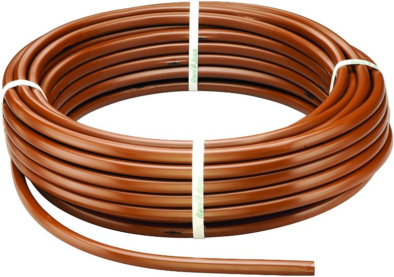 Photo 1 of *READ BELOW** Rain Bird A50924US ET63-100S Drip Irrigation Pressure Compensating 1/2" (0.634" OD) Tubing, 18" Emitter Spacing, 100' Roll, Brown
