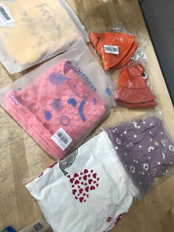 Photo 1 of NONREFUNDABLE BAG OF MIXED BABY CLOTHING AND ACCESORIES - DIFFERENT SIZES AND COLORS 