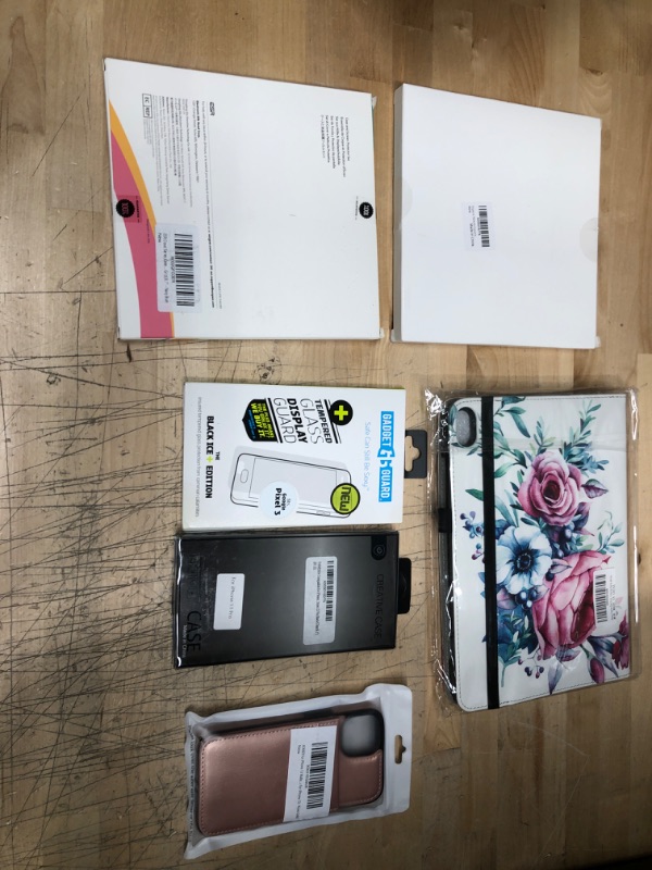 Photo 1 of **NON REFUNDABLE**
BUNDLE OF IPHONE 13 CASE, IPAD CASE,  AND ACCESSORIES.