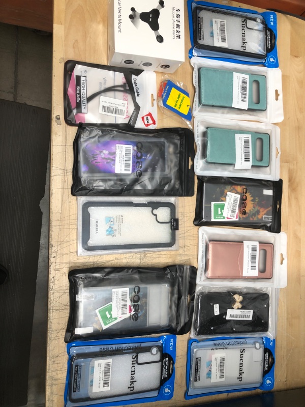 Photo 1 of **NON REFUNDABLE**
BUNDLE OF SAMSUNG CASES & ACCESSORIES .