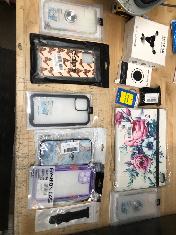 Photo 2 of ** NON REFUNDABLE**
BUNDLE OF IPHONE 12 CASES , APPLE WATCH BAND, IPAD CASE AND ACCESSORIES
