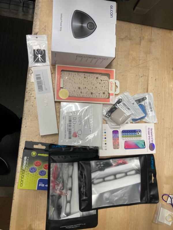 Photo 1 of ** NON-REFUNDABLE** ASSORTED MISCELLANEOUS PHONE, HOME, ANXD APPLE WATCH  ACCESSORIES 
