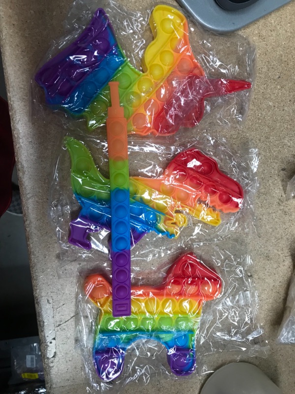 Photo 2 of ** SETS OF 3**
4 Packs Pop Fidget Toy Push Poppers Bubble Fidget Silicone Sensory Toy for Kids Adults Stress Relief (Dinosaur, Unicorn, Dog, Rainbow Bracelet)
