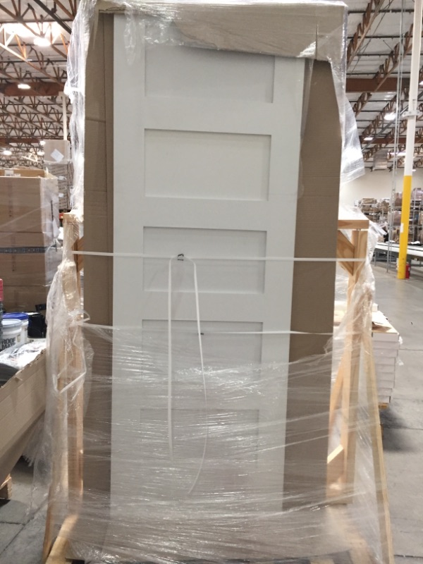 Photo 2 of **SIZE: 80"LX28"W**DOOR HAS MINOR CUT DUE TO BOX CUTTER**
Trimlite  5-Panel Shaker Doors
