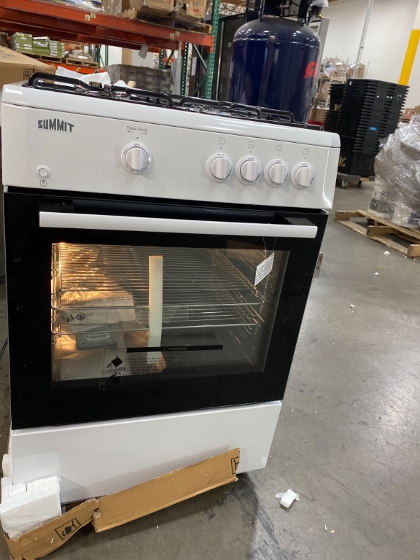 Photo 1 of Summit Appliance 24 in. 2.7 cu. ft. Slide-In Gas Range in White