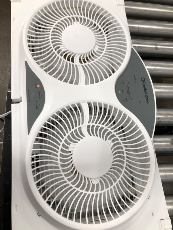 Photo 1 of Used**tested**Comfort Zone 3-Speed Reversible Twin Window Fan with Remote Control
