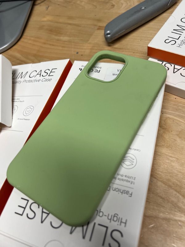 Photo 1 of IPHONE 11 AND 12 PROS PHONE CASE GREEN 4 COUNT SOLD AS IS **NOT REFUNDABLE**
