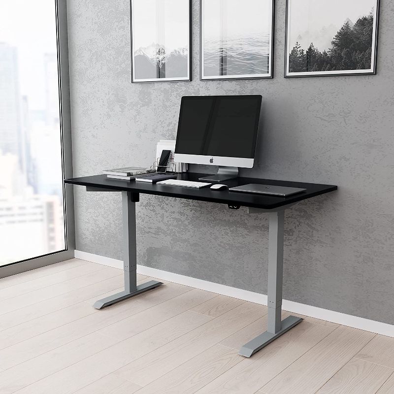 Photo 1 of *INCOMPLETE BOX 1 OF 2 ONLY CONTAINS TABLE TOP **Techni Mobili Power Adjustable, Black sit to Stand Desk, ONE Size
