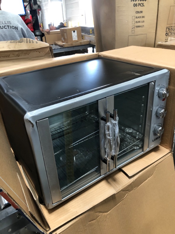 Photo 1 of **MINOR DENTS, SHOWN IN PICTURE*** 31160840 Oster Digital French Door Oven with Convection, Metallic Charcoal
