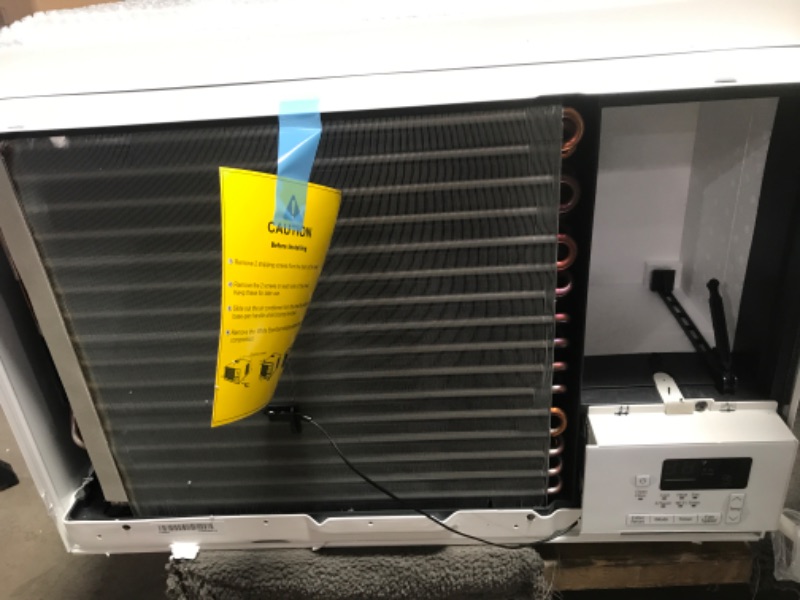 Photo 4 of **MINOR DAMAGE* LG LW1216HR 11,500/12,000 230V Window-Mounted Air Conditioner with 9,200/11,200 BTU Supplemental Heat Function, 12000, White
