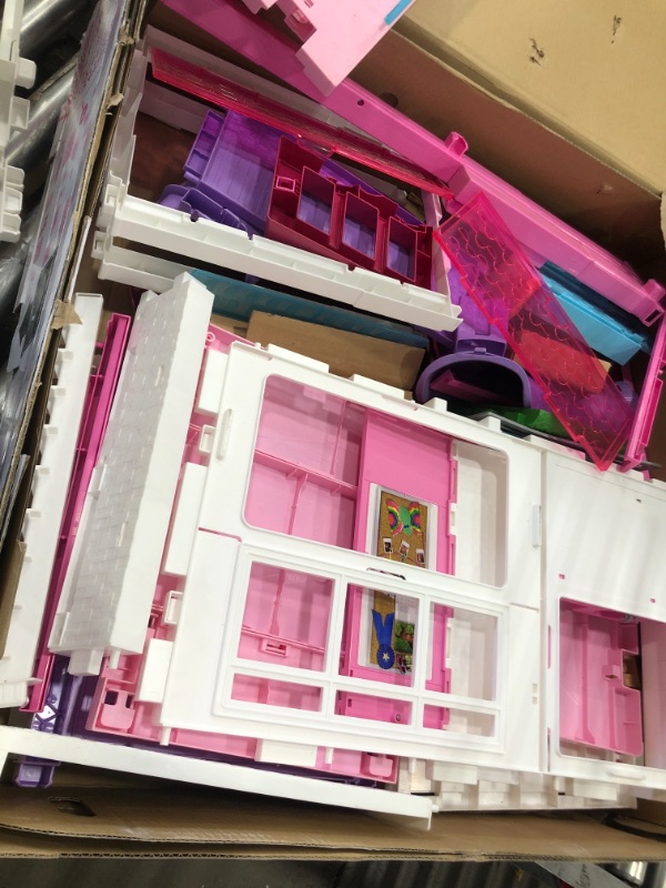 Photo 3 of Barbie Dreamhouse Dollhouse with Wheelchair Accessible Elevator, Pool, Slide and 70 Accessories Including Furniture and Household Items, Gift for 3 to 7 Year Olds
