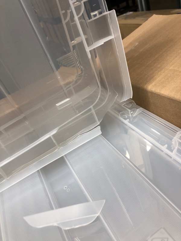 Photo 2 of *Two Lids Major Damage-See Photos* IRIS USA 72 Qt. Plastic Storage Bin Tote Organizing Container with Durable Lid and Secure Latching Buckles, Stackable and Nestable, 4 Pack, Crystal Clear 72 Qt. - 4 Pack, Crystal Clear