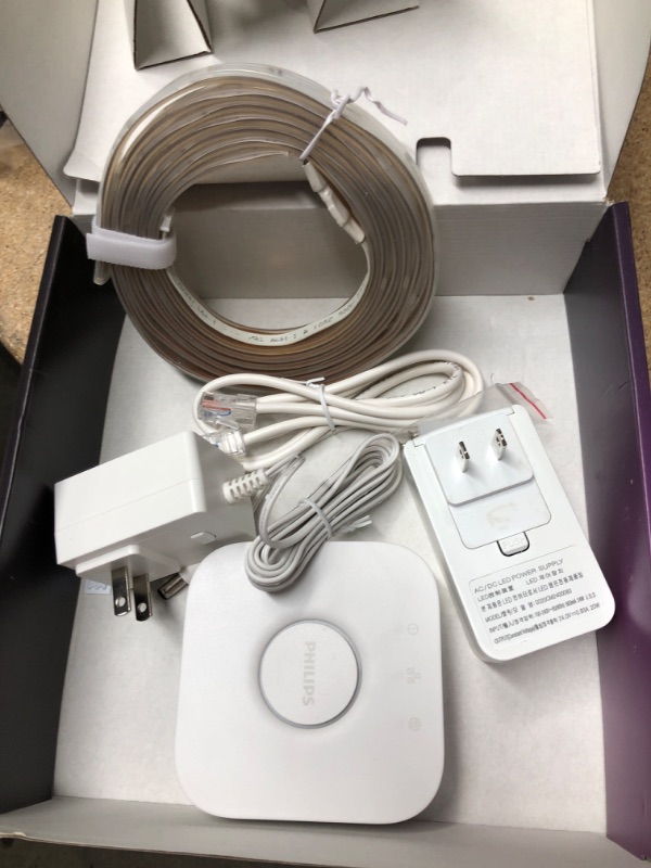 Photo 2 of (INCOMPLETE SET OF POWER ATTACHMENTS) 
Philips Hue White and Color Ambiance Dimmable LED Light Strip Plus Smart Light Starter Kit (80")
