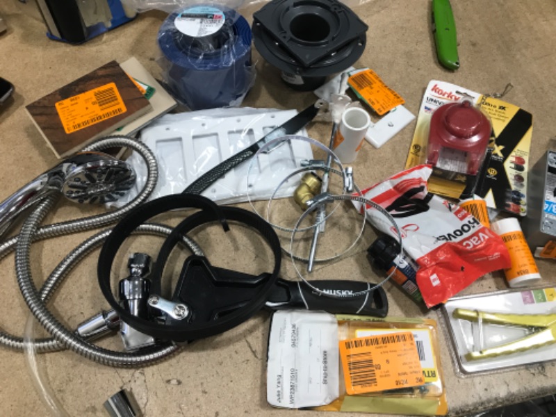 Photo 1 of **NO REFUNDS/RETURNS* -Bundle of miscellaneous home depot goods: parts of shower head, wall plates, husky