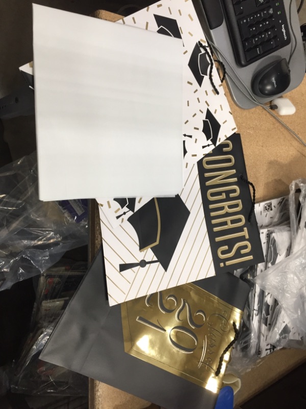 Photo 2 of ** SETS OF 2**
Hallmark 13" Large Graduation Gift Bags Assortment with Tissue Paper (3 Pack: Black and Gold "Class of 2021," "Congrats," Mortarboards)
