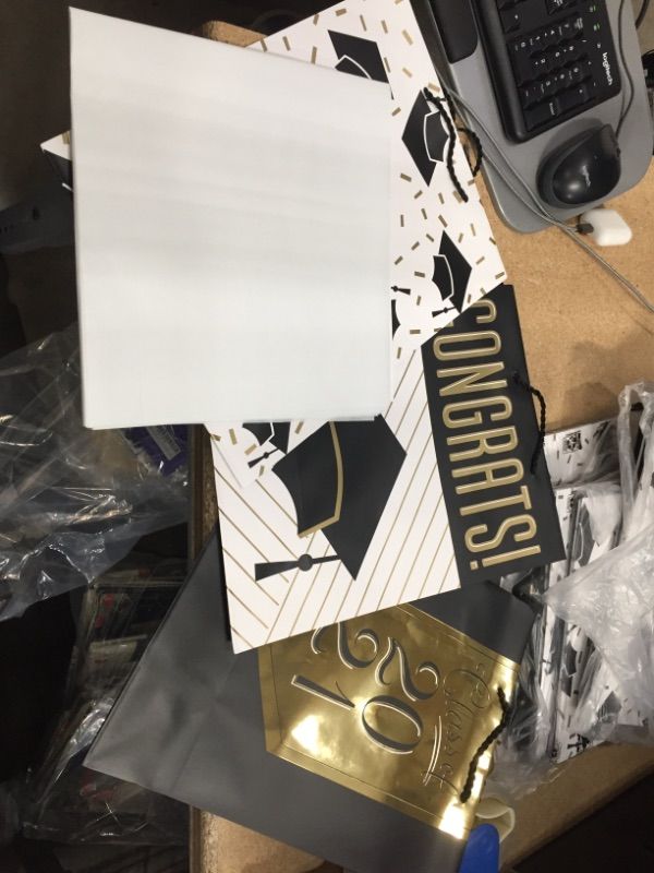 Photo 2 of ** SETS OF 2**
Hallmark 13" Large Graduation Gift Bags Assortment with Tissue Paper (3 Pack: Black and Gold "Class of 2021," "Congrats," Mortarboards)