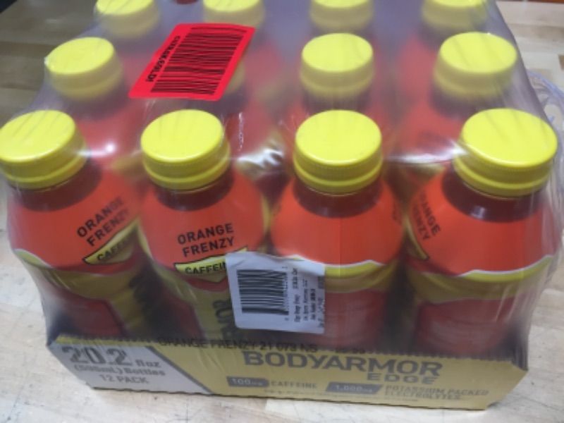 Photo 1 of **MANUFACTURE DATE 3/14/2021// SOLD AS IS//NONREFUNDABLE**
BODYARMOR EDGE Sports Drink with Caffeine, Orange Frenzy, Potassium-Packed Electrolytes, Caffeine Boost, Natural Flavors With Vitamins, Perfect for Athletes 20.2 Fl Oz (Pack of 12)