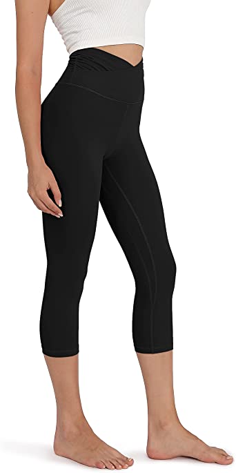 Photo 1 of ODODOS Women's Cross Waist Yoga Capris Leggings, 19'' capris with Pocket, Non See-Through Workout Running Tights Athletic Pants, black
size: small