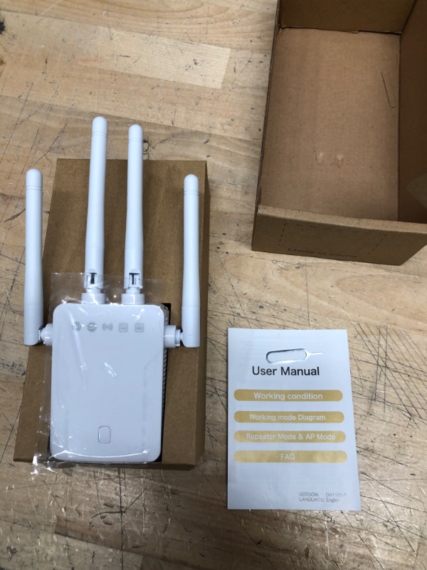 Photo 2 of WiFi Extender,1200Mbps WiFi Extenders Signal Booster for Home, Wall-Through WiFi Repeater with 4 Antennas, Up to 2000sq.ft and 30 Devices
