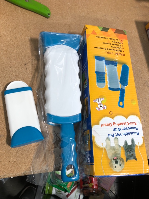 Photo 2 of **PACK OF 2**
Nieboa 1 Large Size and 1 Small Size Portable Pet Hair Removal Brush, with Self Cleaning Base, Which Can Easily Remove Pet Fur and Fluff from Carpets, Sofas, Clothing,Car Seat
