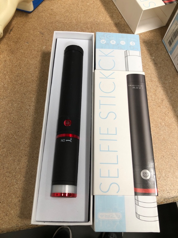 Photo 2 of **SET OF 2**
EZRA Wireless Intelligent Remote Controlled Selfie Stick,Tiny Designed,Stretching Function,Rechargable Batteries,USB Charger Included, Metal TRIPODS,Bluetooth Version, Artificial Flash Light,Make UP
