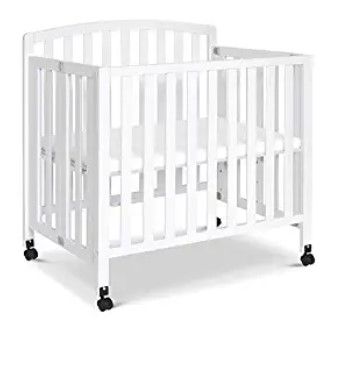 Photo 1 of DaVinci Dylan Folding Portable 3-in-1 Convertible Mini Crib and Twin Bed in White, Greenguard Gold Certified
