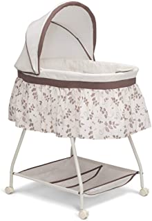 Photo 1 of Delta Children Deluxe Sweet Beginnings Bedside Bassinet - Portable Crib with Lights and Sounds, Falling Leaves