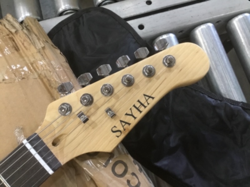Photo 7 of INCOMPLETE (AMP DOES NOT FUNCTION) SAYHA Electric Guitar, 39 Inch Solid Full-size Electric Guitar HSS Pickups Starter Kit Includes Amplifier, Bag, Digital Tuner, Strap, String, Cable, Picks (Black)
**MISSING EXTRA STRINGS, MISSING PICKS, MISSING 2 WHAMMY 