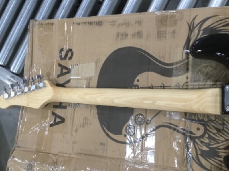 Photo 8 of INCOMPLETE (AMP DOES NOT FUNCTION) SAYHA Electric Guitar, 39 Inch Solid Full-size Electric Guitar HSS Pickups Starter Kit Includes Amplifier, Bag, Digital Tuner, Strap, String, Cable, Picks (Black)
**MISSING EXTRA STRINGS, MISSING PICKS, MISSING 2 WHAMMY 