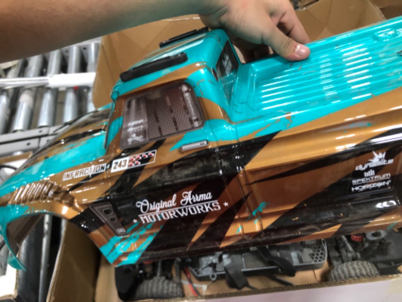 Photo 7 of (USED)ARRMA RC Truck 1/8 Infraction 4X4 MEGA Resto-Mod Truck RTR (4 AA Batteries for Transmitter Not Included) , ARA4215V3T2, Teal/Bronze
