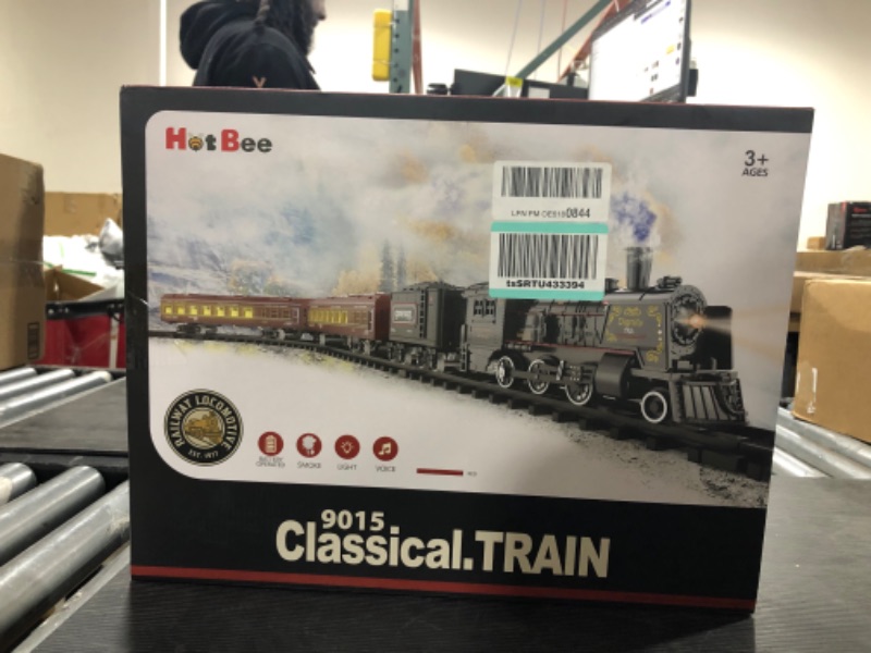 Photo 2 of Hot Bee Model Train Set for Boys - Metal Alloy Electric Trains w/ Steam Locomotive,Passenger Carriages & Tracks,Train Toys w/ Smoke,Sounds & Lights,Christmas Toys for 3 4 5 6 7+ Years Old Kids Red