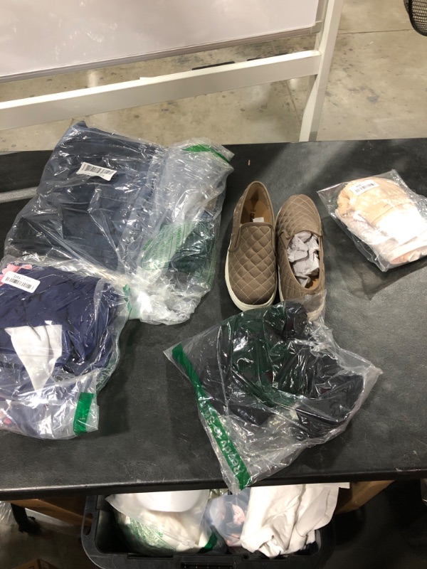 Photo 1 of LOT OF MISC CLOTHING ITEMS OF VARIOUS SIZES COLORS AND STYLES SOLD AS IS