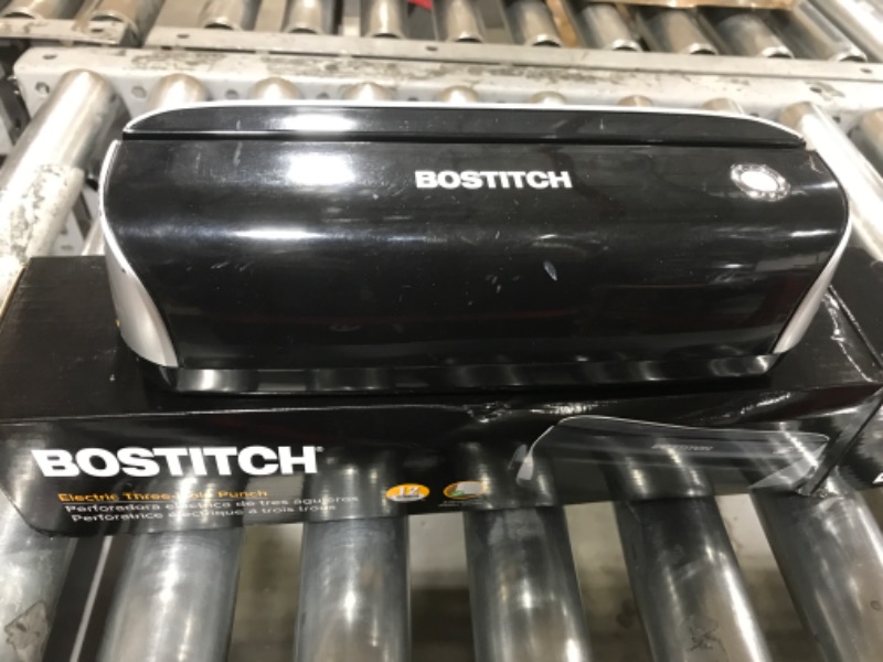 Photo 2 of Bostitch Electric 3-Hole Punch, AC Adapter or Battery Powered, Max Sheet Capaity 12 Sheets, Black (EHP3BLK)