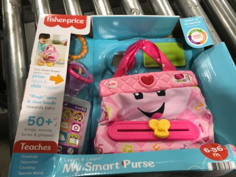 Photo 2 of Fisher-Price Smart Purse Learning Toy with Lights, Smart Stages Educational Content for Baby and Toddler Dress Up, Pink?