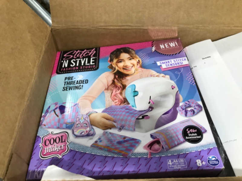 Photo 2 of Cool Maker, Stitch ‘N Style Fashion Studio, Pre-Threaded Sewing Machine Toy with Fabric and Water Transfer Prints, Arts & Crafts Kids Toys for Girls