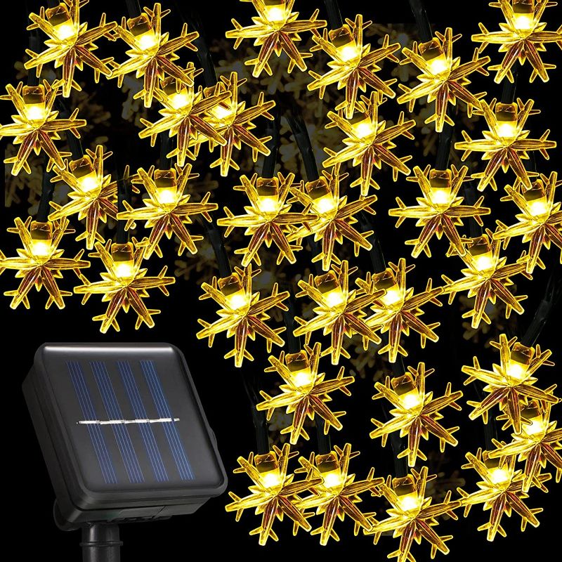 Photo 1 of  30 LED Solar Snowflake Lights Christmas String Lights 21.3 Feet Waterproof 8 Modes Solar Powered Fairy Lights for Wedding Party Garden Bedroom Outdoor Indoor Christmas Decoration (Warm Light) https://a.co/d/0R4uPLl