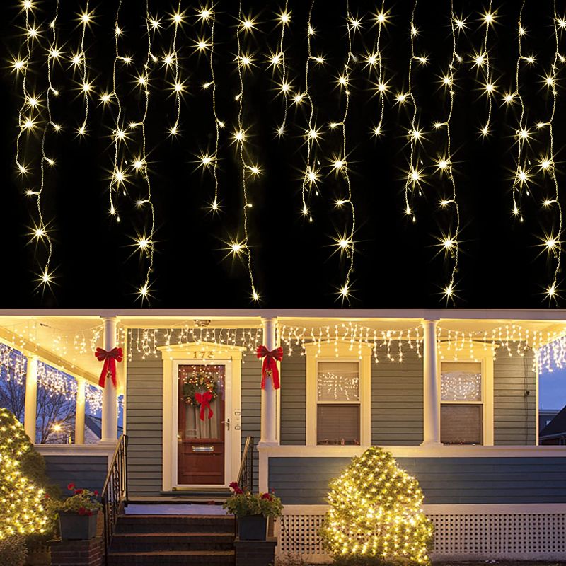 Photo 1 of  Joliyoou Christmas Lights, 360 LED 29.5ft Window Christmas Lights, 8 Modes Curtain Fairy Lights with 60 Drops, Outdoor Indoor Xmas Holiday Wedding Party Decorations, Warm White 