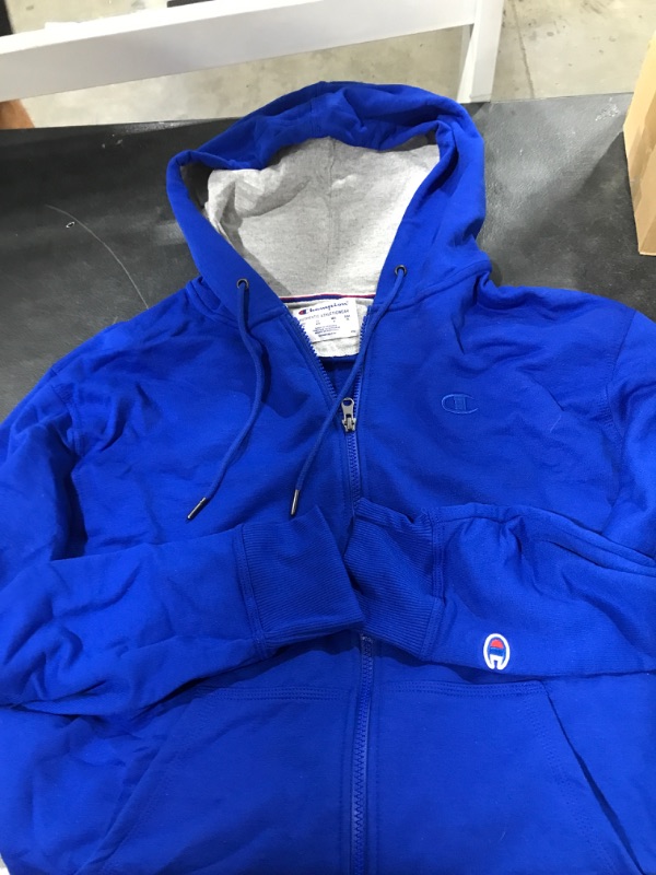 Photo 1 of Blue Champion zip up sweater size M 
Champion