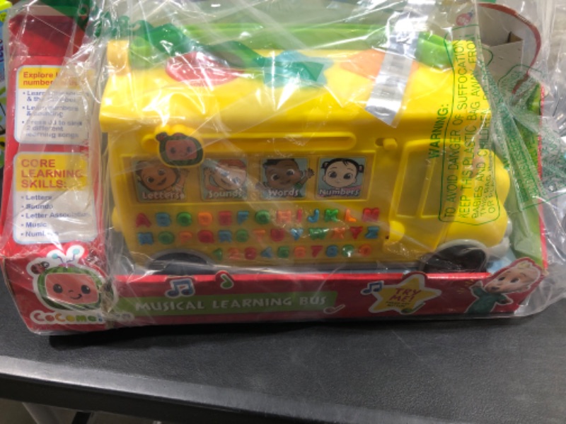 Photo 1 of CoComelon Musical Learning Bus, Number and Letter Recognition, Phonetics, Yellow School Bus Toy Plays ABCs and Wheels on the Bus, by Just Play