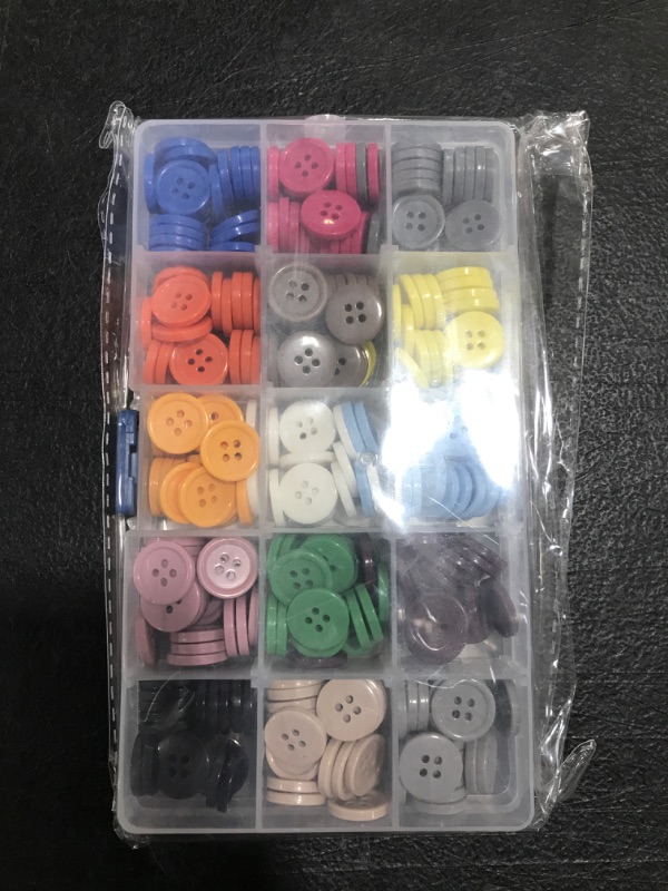 Photo 1 of BOX OF ASSORTED CLOTHING BUTTONS. VARIOUS COLORS. 