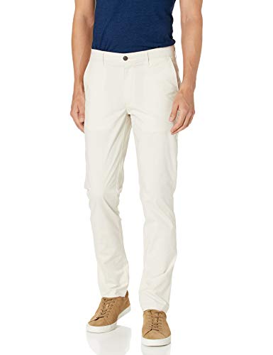 Photo 1 of Amazon Essentials Men's Skinny-Fit Lightweight Stretch Pant, Stone, 32W X 31L
