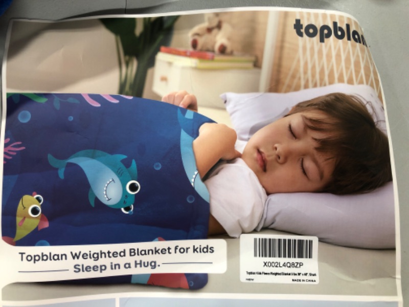 Photo 1 of Sleep in A hug Weighted Blanket for kids blue