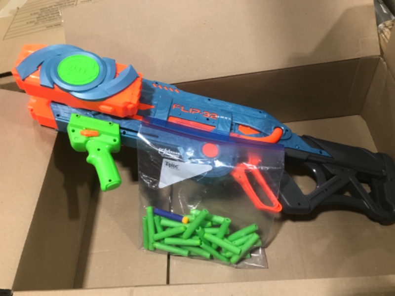 Photo 2 of  NERF Elite 2.0 Flipshots Flip-32 Blaster, Rotating Dart Barrels, 32-Dart Capacity, 32 Elite Darts, Toy Foam Blasters, Kids Outdoor Games & Toys for Boys & Girls 