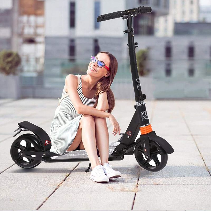 Photo 1 of  Kids/Adult Scooter with 3 Seconds Easy-Folding System, 220lb Folding Adjustable Scooter with Foot Brake and 200mm Large Wheels 