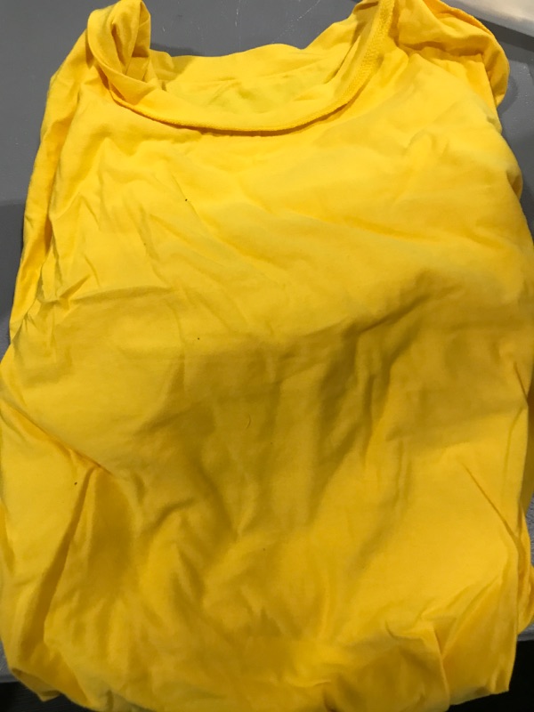 Photo 1 of YELLOW TSHIRT 
SIZE 2XL